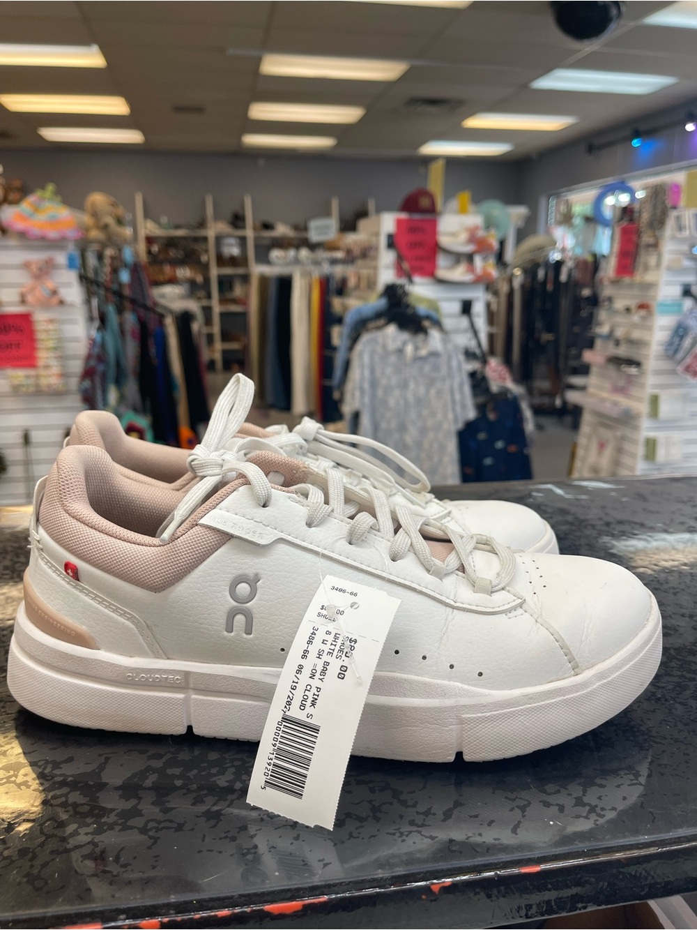 On Running White Sneakers with Light Pink Accents